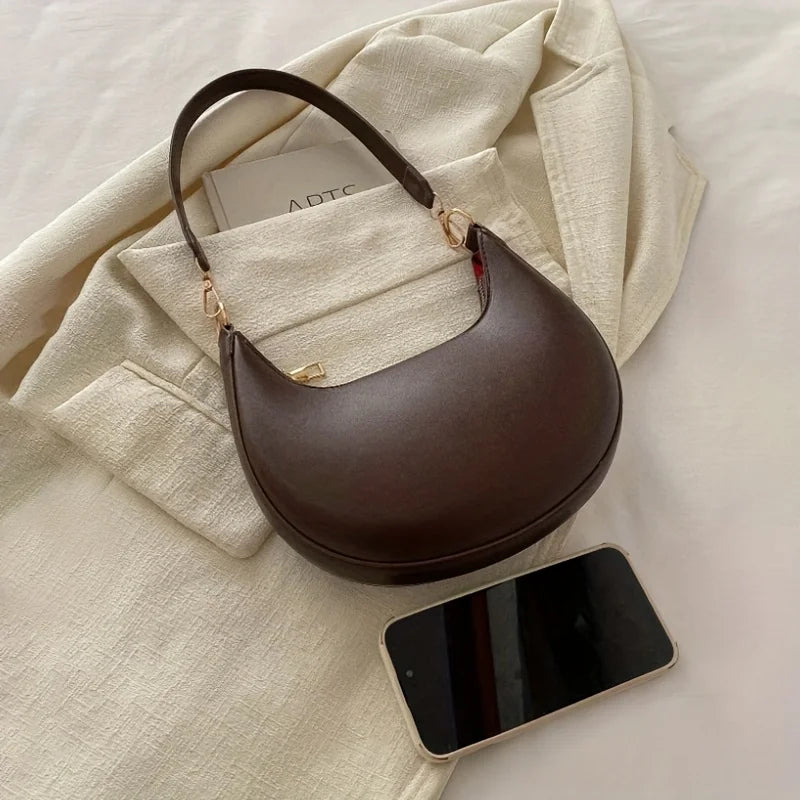 Nova bolsa de ombro elegante em forma de lua de alta qualidade.