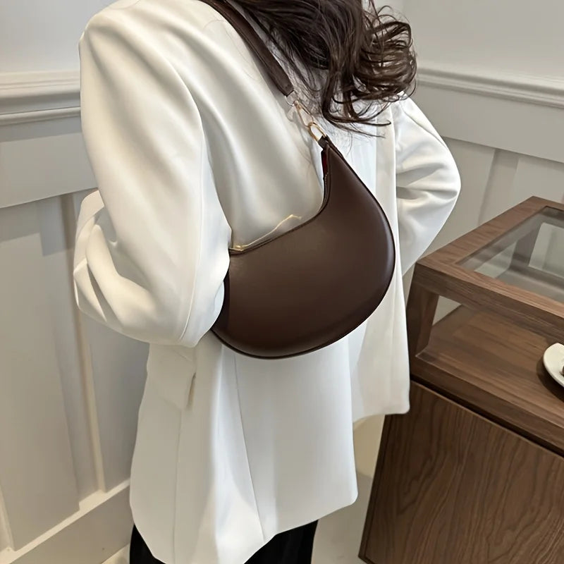 Nova bolsa de ombro elegante em forma de lua de alta qualidade.