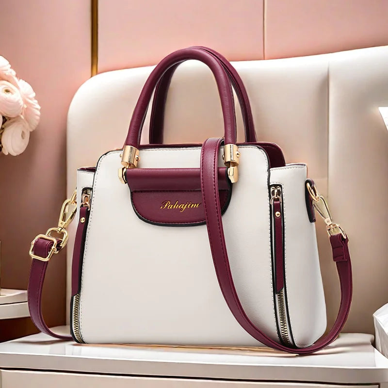 Bolsa feminina 2025, nova moda feminina em diversas cores. Possui praticidade. Pode ser usada no ombro e nas mãos.