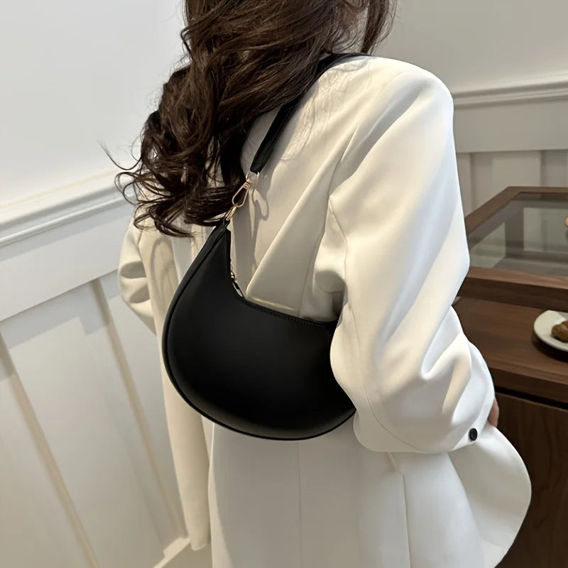 Nova bolsa de ombro elegante em forma de lua de alta qualidade.