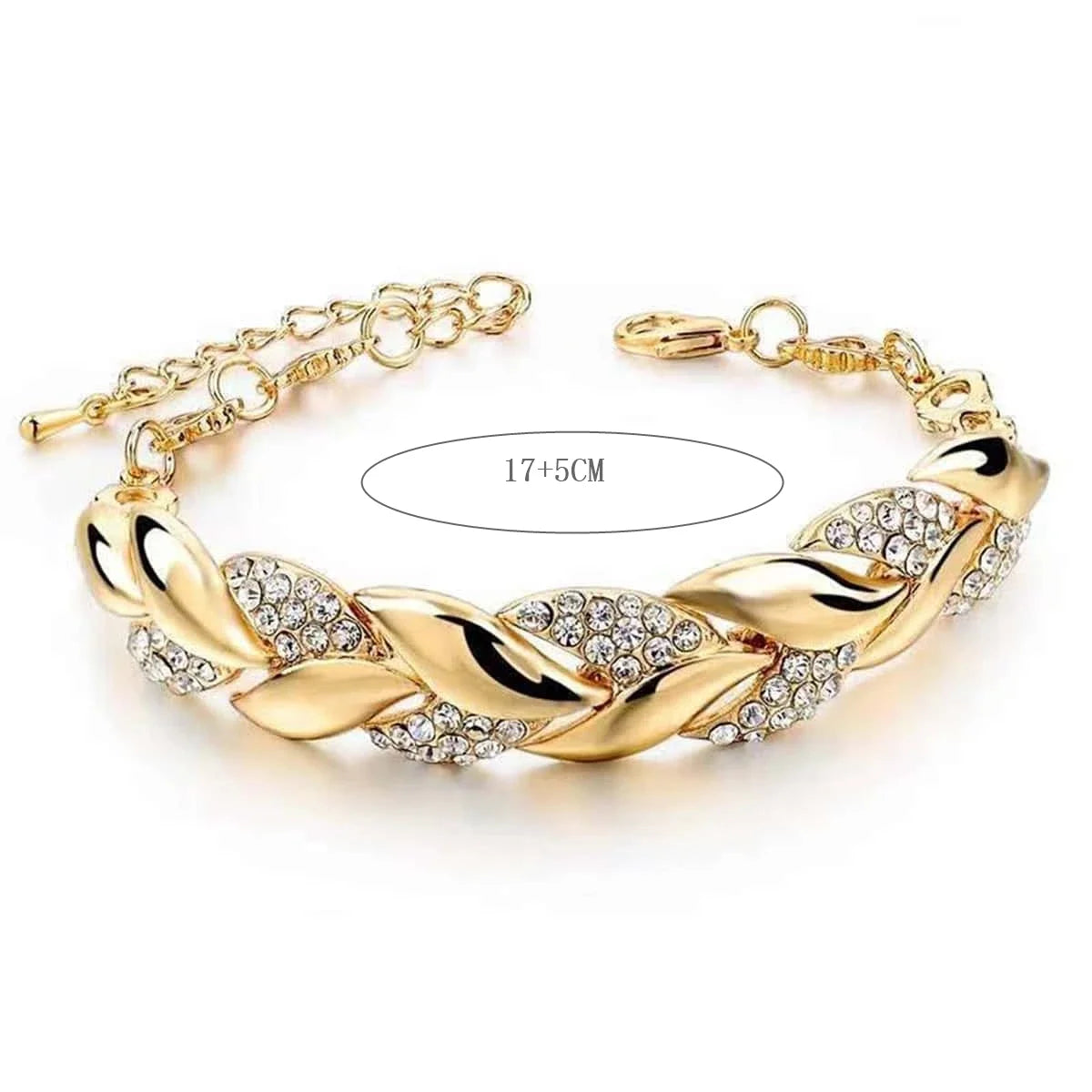 Pulseira feminina folheado a ouro com pedrinhas brilhantes de cristal. Ajustável no braço.