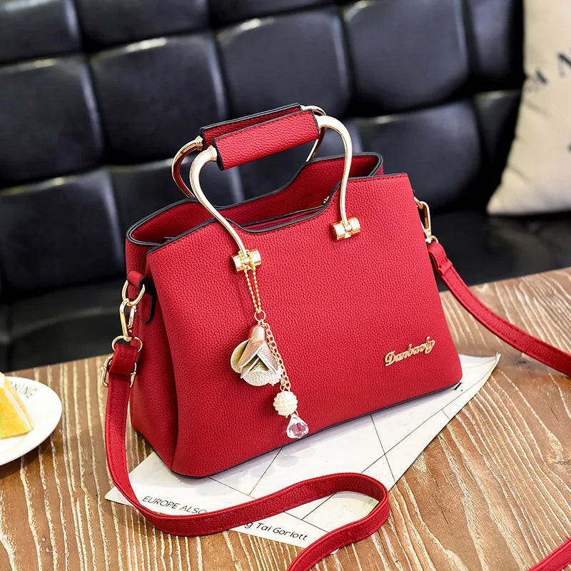Bolsa Danbaoly de luxo para mulheres. Couro plutônio, pingente crossbody. Opção de manuseio a mão ou ombro