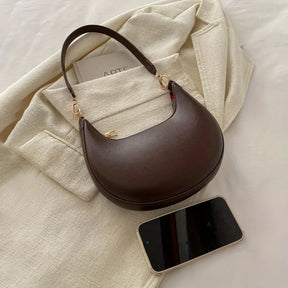 Nova bolsa de ombro elegante em forma de lua de alta qualidade.