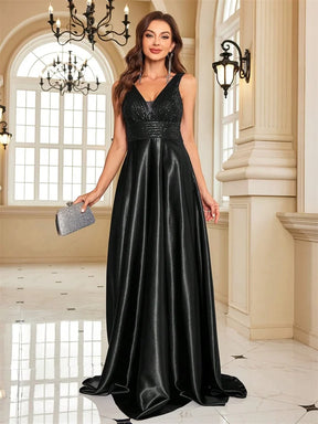 Vestido de Noite com Lantejoulas e Decote em V – Elegância e Sofisticação 2025