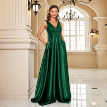 Vestido de Noite com Lantejoulas e Decote em V – Elegância e Sofisticação 2025