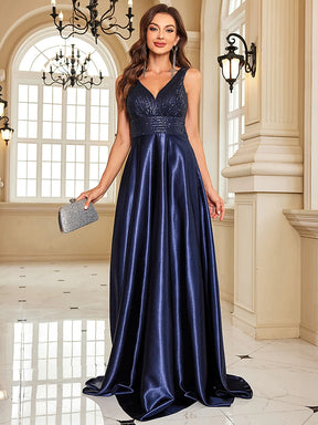 Vestido de Noite com Lantejoulas e Decote em V – Elegância e Sofisticação 2025