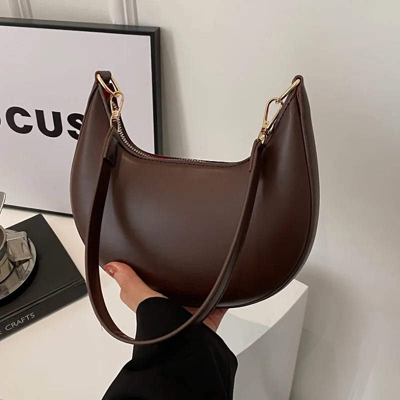 Nova bolsa de ombro elegante em forma de lua de alta qualidade.