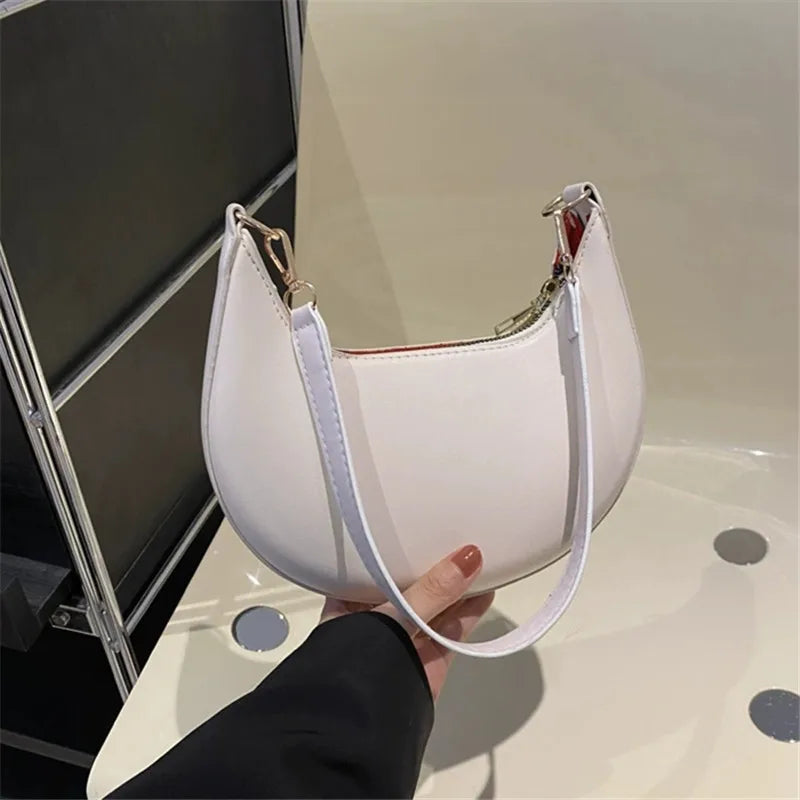 Nova bolsa de ombro elegante em forma de lua de alta qualidade.