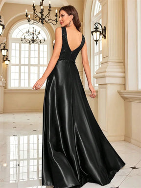 Vestido de Noite com Lantejoulas e Decote em V – Elegância e Sofisticação 2025