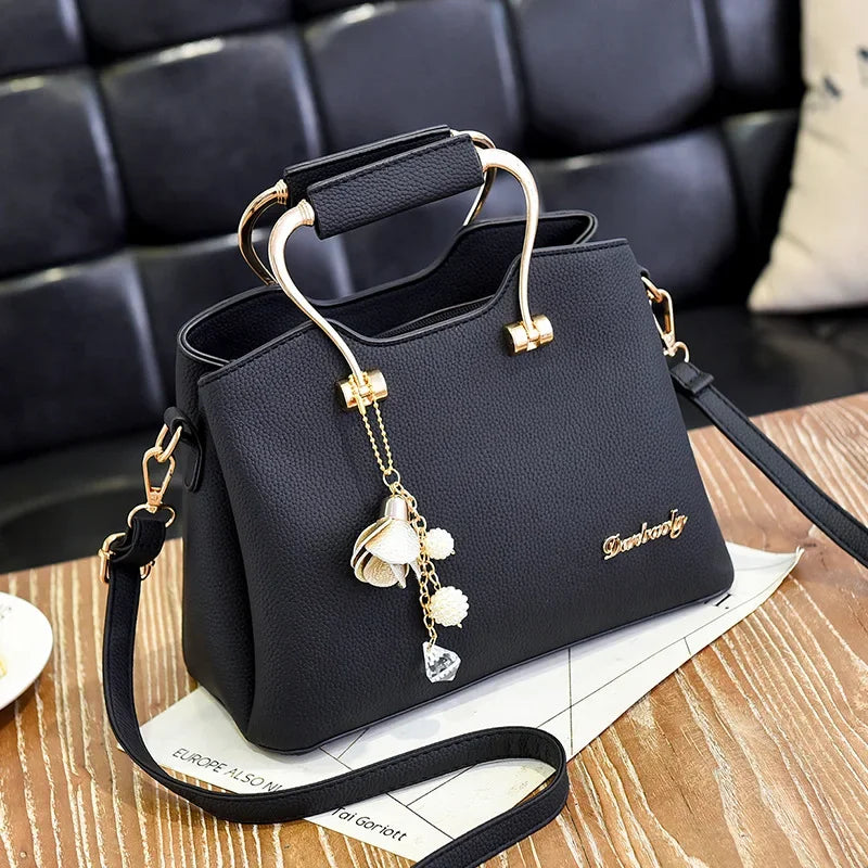 Bolsa Danbaoly de luxo para mulheres. Couro plutônio, pingente crossbody. Opção de manuseio a mão ou ombro
