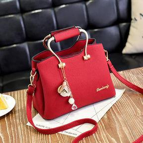 Bolsa Danbaoly de luxo para mulheres. Couro plutônio, pingente crossbody. Opção de manuseio a mão ou ombro